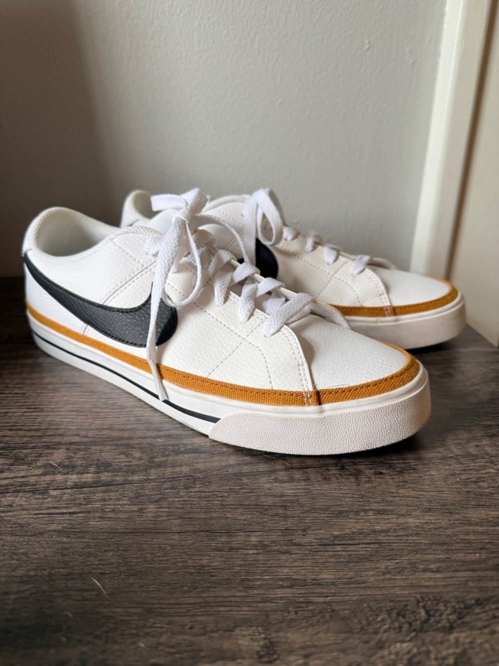 Nike Men’s White Low-Top Sneakers with Black Swoosh and Tan Accent